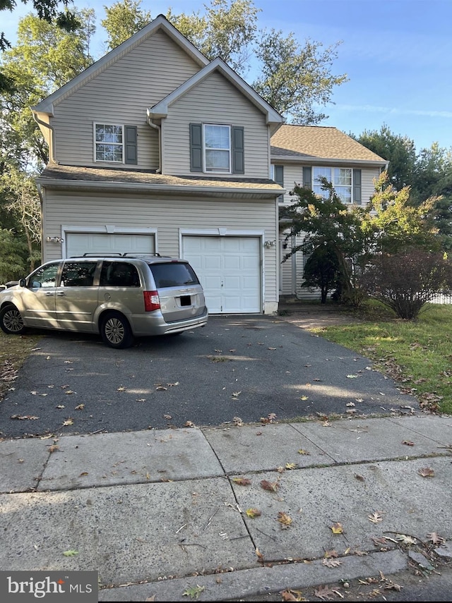 view of front property with a garage