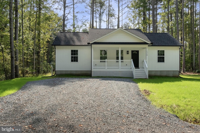 view of front of house with a front lawn and a porch