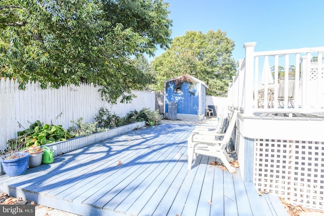 deck featuring a storage shed