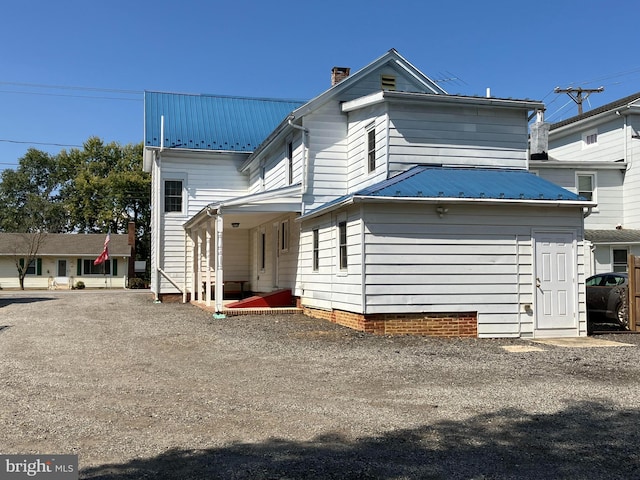 back of house featuring a patio