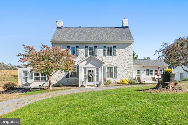 colonial house with a front yard