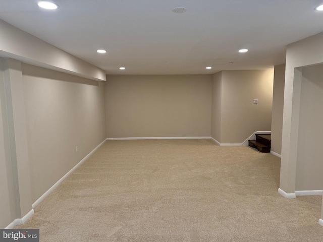 basement with light carpet