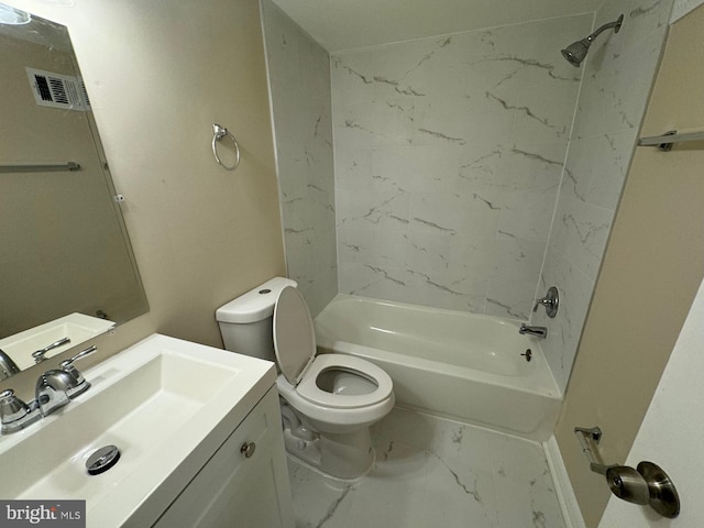 full bathroom with vanity, tiled shower / bath combo, and toilet