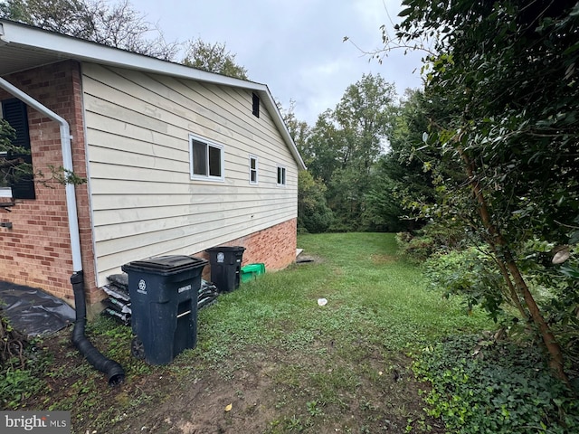 view of property exterior featuring a yard