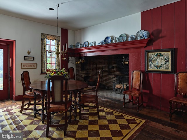 dining space featuring dark wood-type flooring