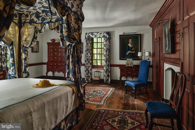 bedroom featuring dark hardwood / wood-style flooring