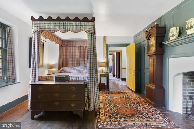 bedroom featuring dark hardwood / wood-style floors