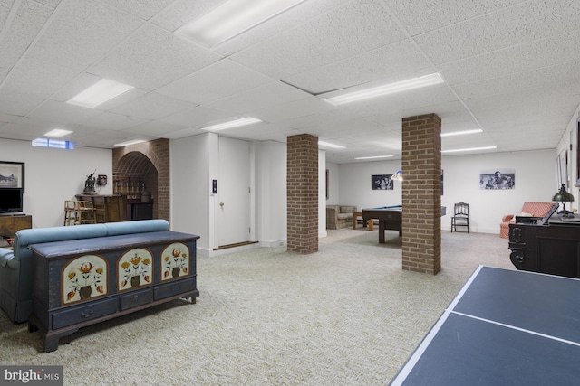 interior space featuring carpet, decorative columns, a drop ceiling, and billiards