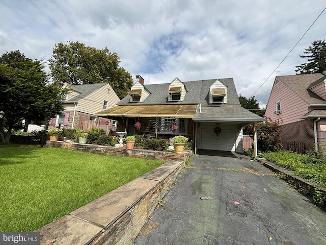 view of front of property featuring a carport, a porch, and a front lawn