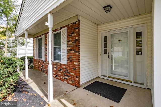 entrance to property with covered porch