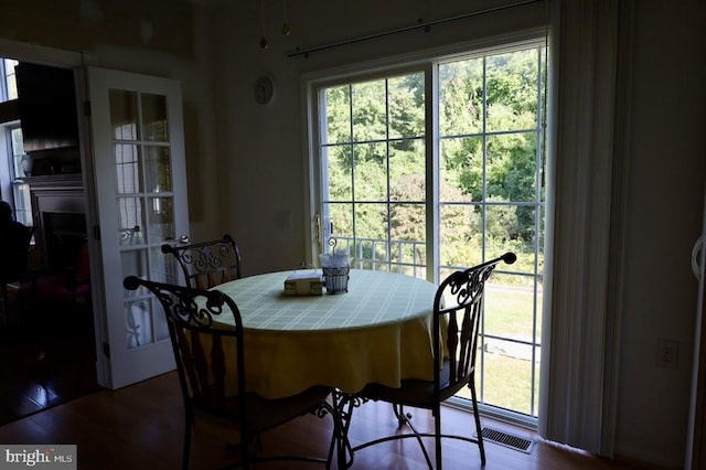 dining area with hardwood / wood-style flooring