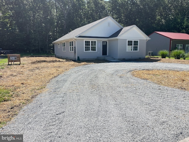 view of front of home with cooling unit