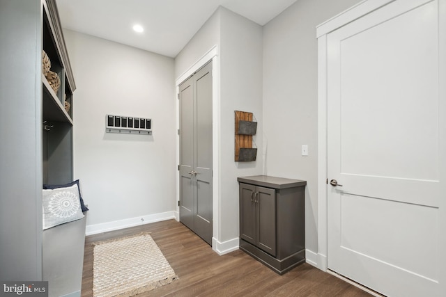 interior space with dark hardwood / wood-style floors