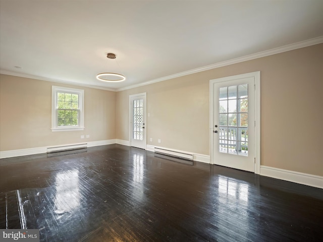 spare room with ornamental molding, a baseboard radiator, and hardwood / wood-style floors