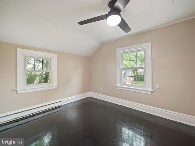 additional living space featuring wood-type flooring, lofted ceiling, and ceiling fan