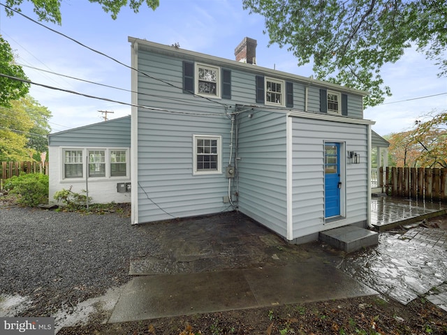 rear view of house with a patio