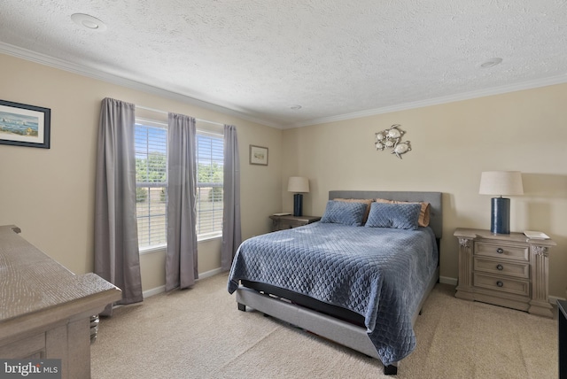 bedroom with a textured ceiling, ornamental molding, and light colored carpet