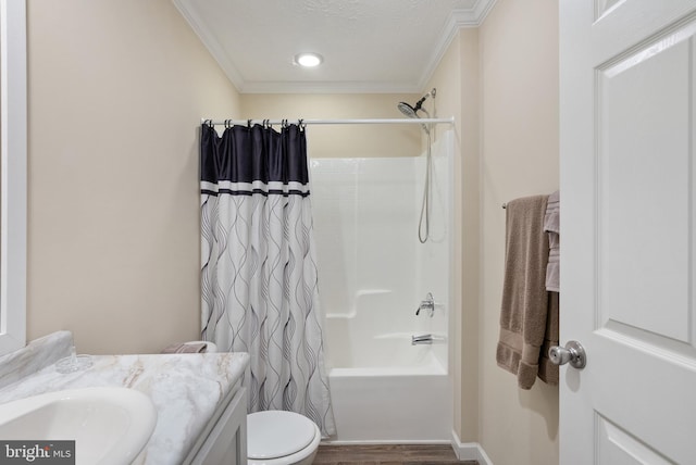 full bathroom with vanity, shower / bath combo, hardwood / wood-style flooring, ornamental molding, and toilet