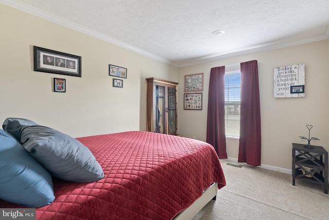 carpeted bedroom with a textured ceiling and ornamental molding