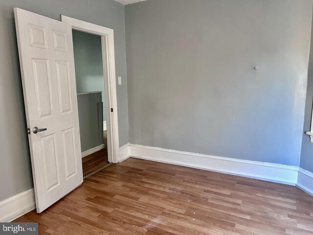 1128 Everett St, Camden, NJ 08104 - unfurnished bedroom featuring baseboards and wood finished floors