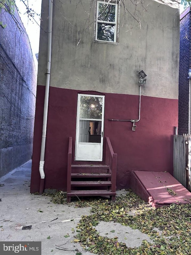 1128 Everett St, Camden, NJ 08104 - doorway to property with stucco siding