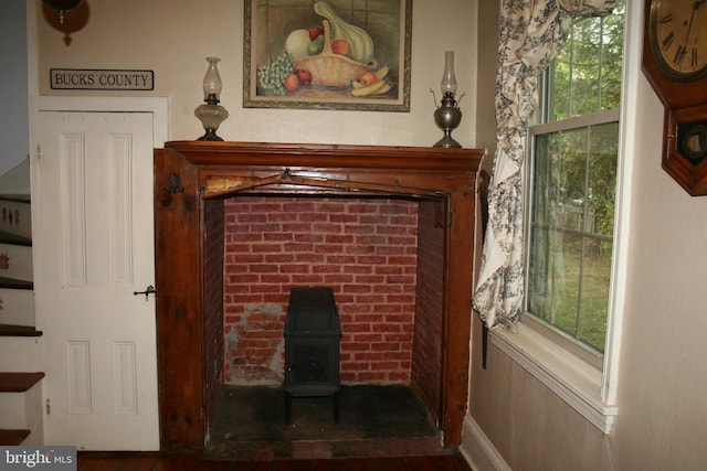 interior details featuring a wood stove