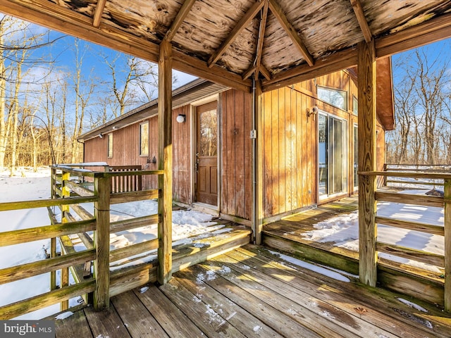 view of snow covered deck