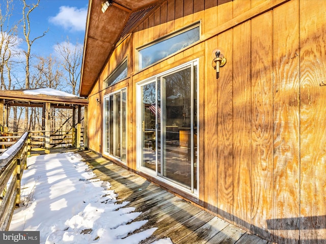 view of snow covered deck