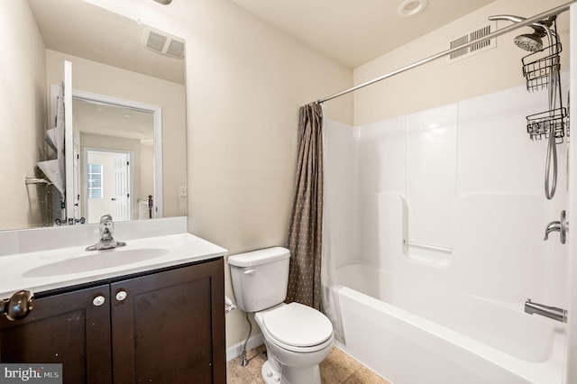 full bathroom featuring shower / bathtub combination with curtain, tile patterned floors, vanity, and toilet