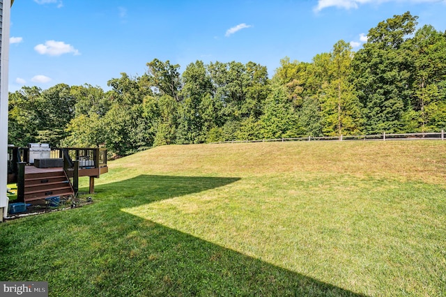 view of yard featuring a deck