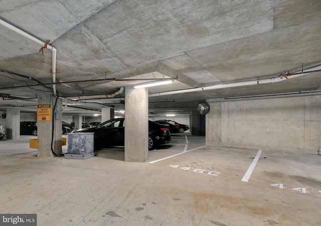 garage featuring a carport