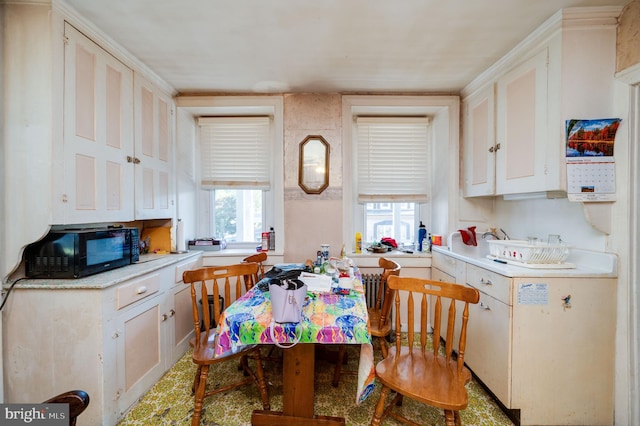 kitchen with white cabinetry