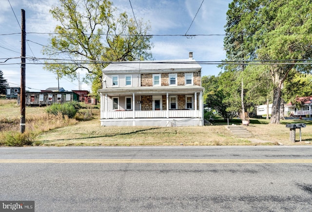 view of front of house with covered porch