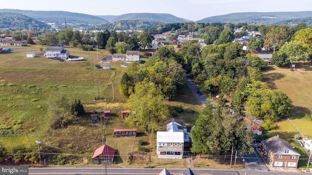 drone / aerial view featuring a mountain view