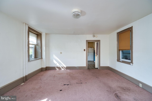 unfurnished room with carpet floors