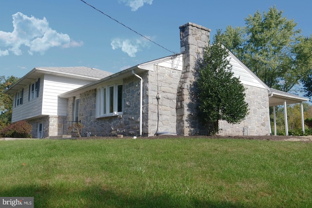 view of property exterior featuring a yard