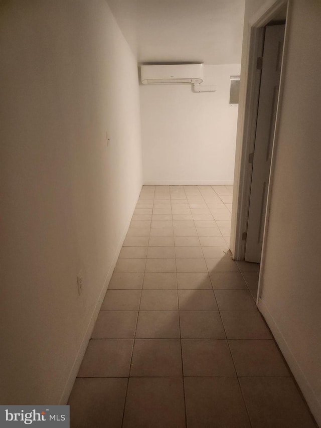 3839 1st St SE, Washington, DC 20032 - corridor featuring tile patterned floors and a wall mounted AC