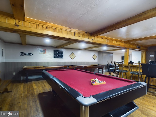 game room featuring wood walls, beamed ceiling, billiards, and hardwood / wood-style flooring