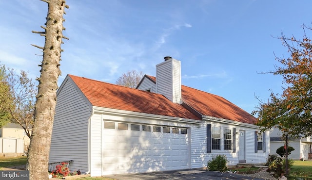 view of front of house with a garage