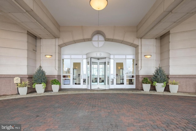 property entrance featuring french doors