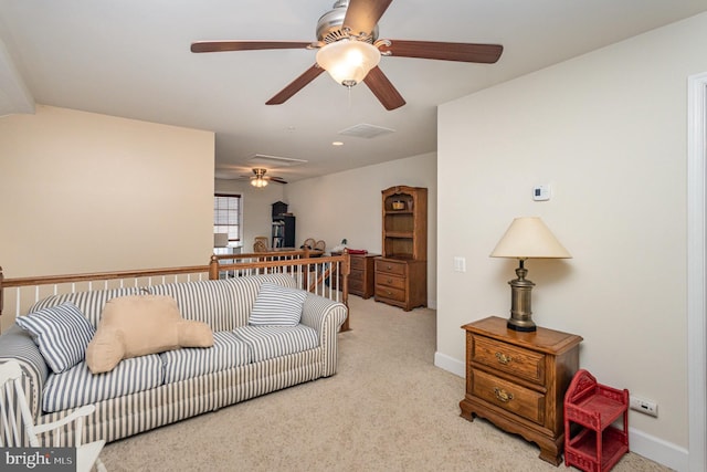 living room featuring light colored carpet and ceiling fan