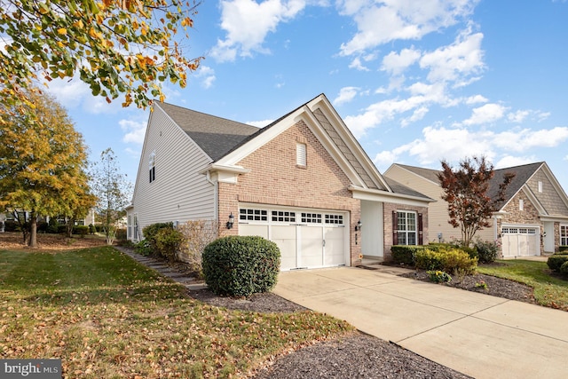 10 Eagle Bluff St, Fredericksburg, VA 22406 - view of front facade featuring brick siding, concrete driveway, and a front lawn