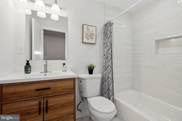 full bathroom featuring toilet, shower / tub combo with curtain, and vanity