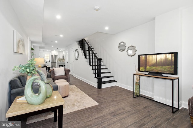 living room featuring dark hardwood / wood-style floors