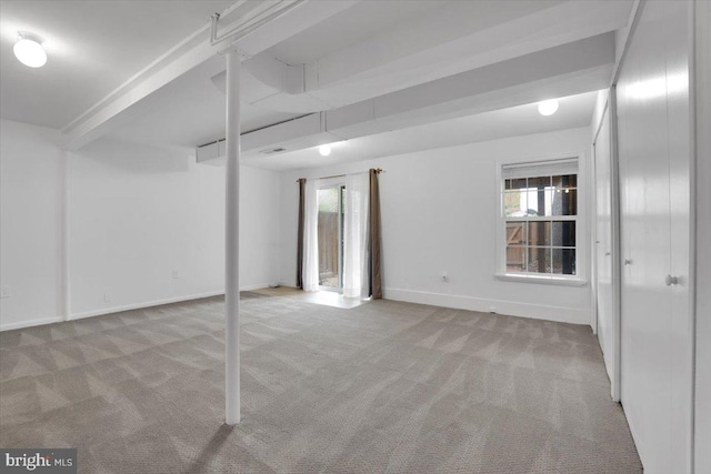 basement with light colored carpet