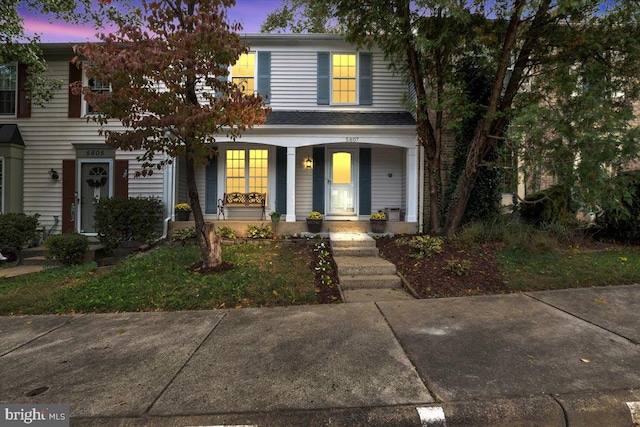 view of front facade featuring covered porch