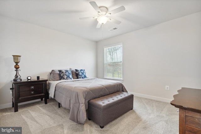 bedroom featuring ceiling fan and light colored carpet