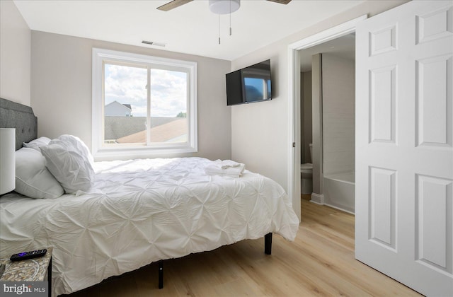 bedroom featuring light wood-type flooring and ceiling fan