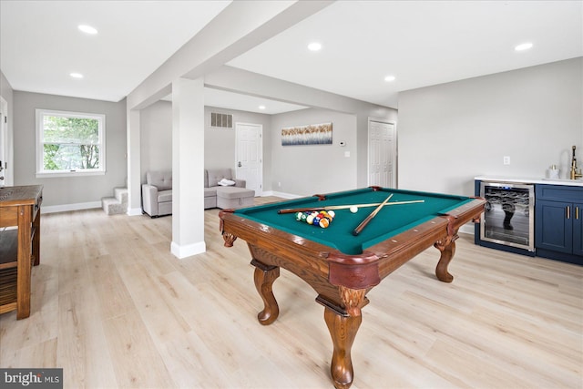 recreation room featuring indoor wet bar, wine cooler, pool table, and light hardwood / wood-style floors