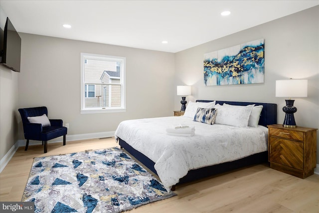 bedroom featuring light wood-type flooring